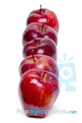 Fresh And Healthy Red Apples In A Row Stock Photo