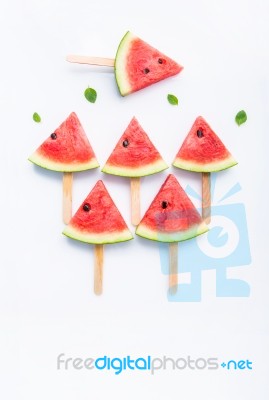 Fresh And Sweet Watermelon Slice Popsicles On White Background Stock Photo