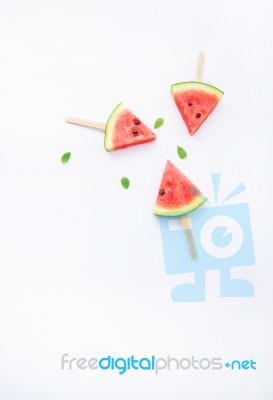 Fresh And Sweet Watermelon Slice Popsicles On White Background Stock Photo