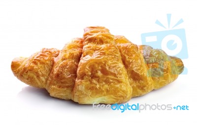 Fresh And Tasty Croissant Over White Background Stock Photo