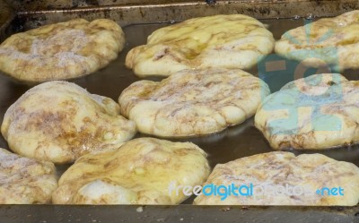 Fresh Apple Cinnamon Fritters In The Fryer Stock Photo