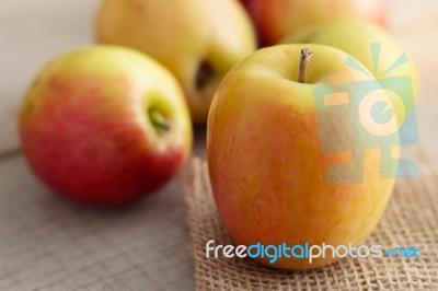 Fresh Apples On Wooden Stock Photo