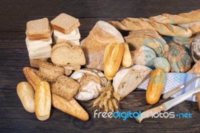 Fresh Assortment Of Baked Bread Varieties Stock Photo