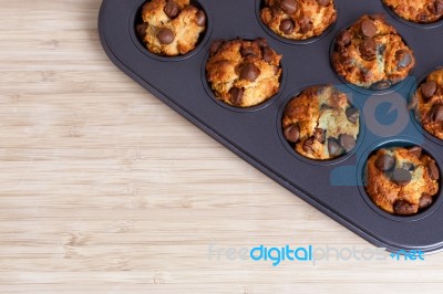 Fresh Baked Muffins Background Stock Photo