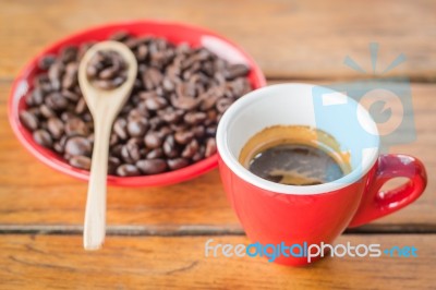 Fresh Brewed Hot Espresso With Roasted Bean Stock Photo