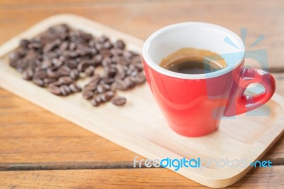 Fresh Brewed Hot Espresso With Roasted Bean Stock Photo