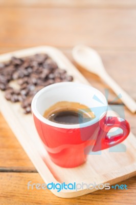 Fresh Brewed Hot Espresso With Roasted Bean Stock Photo