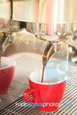 Fresh Brewing Hot Coffee From Espresso Machine With Vintage Filt… Stock Photo