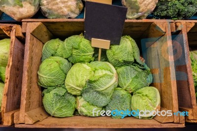 Fresh Cabbage Vegetable In Wooden Box Stall In Greengrocery With Blank Chalkboard Label Stock Photo