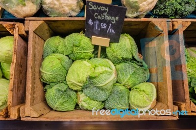 Fresh Cabbage Vegetable In Wooden Box Stall In Greengrocery With Price Chalkboard Label Stock Photo