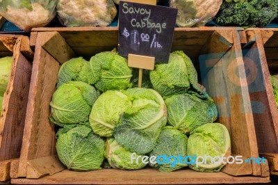 Fresh Cabbage Vegetable In Wooden Box Stall In Greengrocery With Price Chalkboard Label Stock Photo