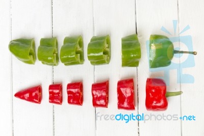 Fresh Cayenne Sweet Peppers Sliced In Pieces Stock Photo