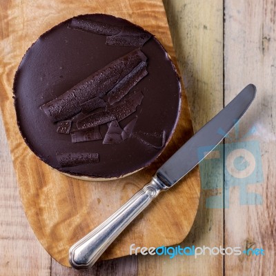 Fresh Classic Homemade Cheesecake With Dark Chocolate Topping Stock Photo