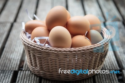 Fresh Eggs In Basket Stock Photo