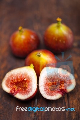 Fresh Figs Over Old Wood Stock Photo