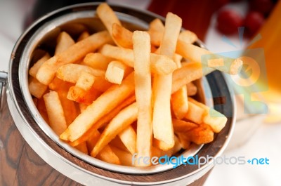 Fresh French Fries On A Bucket Stock Photo