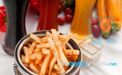 Fresh French Fries On A Bucket Stock Photo