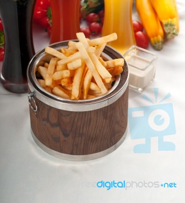 Fresh French Fries On A Bucket Stock Photo