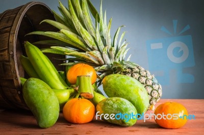 Fresh Fruits On A Wooden Stock Photo