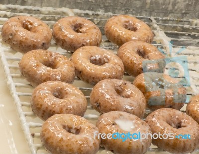 Fresh Glazed Donuts Stock Photo