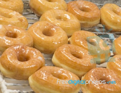 Fresh Glazed Donuts Stock Photo