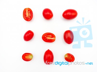 Fresh Grape Or Cherry Tomato On White Background Stock Photo