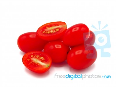 Fresh Grape Or Cherry Tomato On White Background Stock Photo