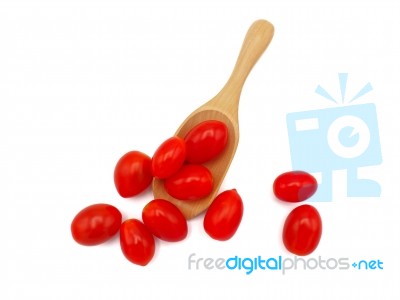 Fresh Grape Or Cherry Tomato With Wooden Spoon On White Backgrou… Stock Photo