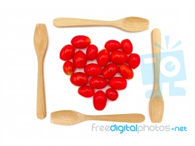 Fresh Grape Or Cherry Tomato With Wooden Spoon On White Backgrou… Stock Photo