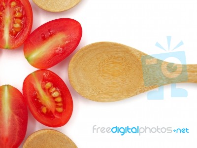 Fresh Grape Or Cherry Tomato With Wooden Spoon On White Backgrou… Stock Photo