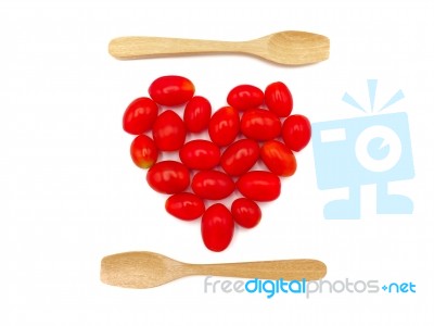 Fresh Grape Or Cherry Tomato With Wooden Spoon On White Backgrou… Stock Photo