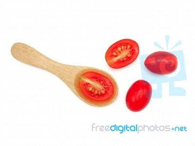 Fresh Grape Or Cherry Tomato With Wooden Spoon On White Backgrou… Stock Photo