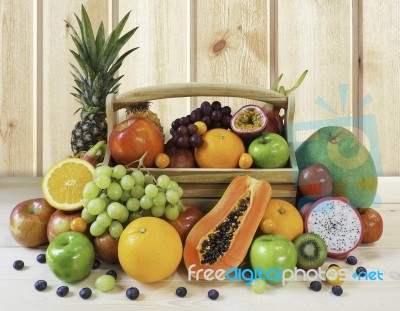 Fresh Healthy And Juicy Fruits On Wooden Background Stock Photo