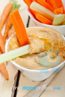 Fresh Hummus Dip With Raw Carrot And Celery Stock Photo