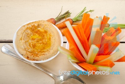 Fresh Hummus Dip With Raw Carrot And Celery Stock Photo