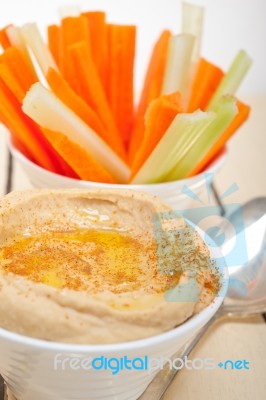 Fresh Hummus Dip With Raw Carrot And Celery Stock Photo