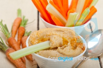 Fresh Hummus Dip With Raw Carrot And Celery Stock Photo