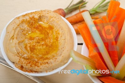 Fresh Hummus Dip With Raw Carrot And Celery Stock Photo