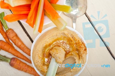 Fresh Hummus Dip With Raw Carrot And Celery Stock Photo