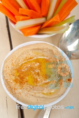 Fresh Hummus Dip With Raw Carrot And Celery Stock Photo