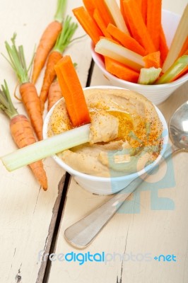 Fresh Hummus Dip With Raw Carrot And Celery Stock Photo