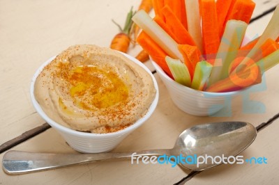 Fresh Hummus Dip With Raw Carrot And Celery Stock Photo