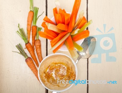 Fresh Hummus Dip With Raw Carrot And Celery Stock Photo