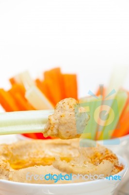 Fresh Hummus Dip With Raw Carrot And Celery Stock Photo