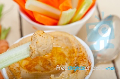 Fresh Hummus Dip With Raw Carrot And Celery Stock Photo