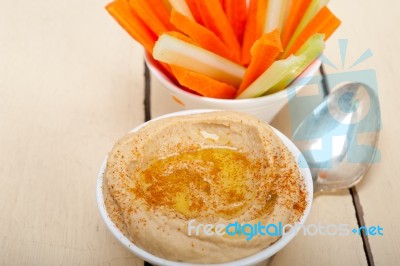 Fresh Hummus Dip With Raw Carrot And Celery Stock Photo