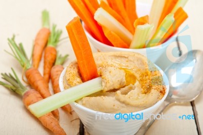 Fresh Hummus Dip With Raw Carrot And Celery Stock Photo