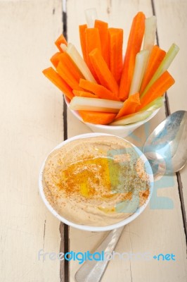 Fresh Hummus Dip With Raw Carrot And Celery Stock Photo