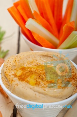 Fresh Hummus Dip With Raw Carrot And Celery Stock Photo