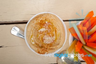 Fresh Hummus Dip With Raw Carrot And Celery Stock Photo